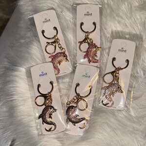 Mint Sparkling Dolphin Keychains in Pink, Black and White